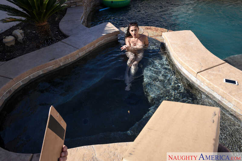 Scene from Naughty America Ariana Marie porn video 'Ariana Marie fucking in the bed with her brown eyes' where Ariana Marie is naked in a hot tub with a man.