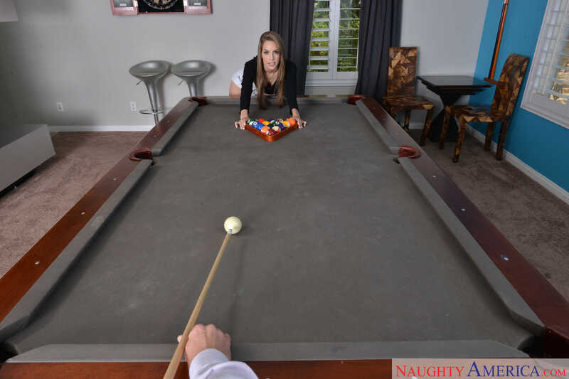 American Daydreams Kimmy Granger porn scene 'Natural cutie Kimmy Granger plays strip pool with client before taking his balls on the table ' - Kimmy Granger is playing pool in a room with a pool table.