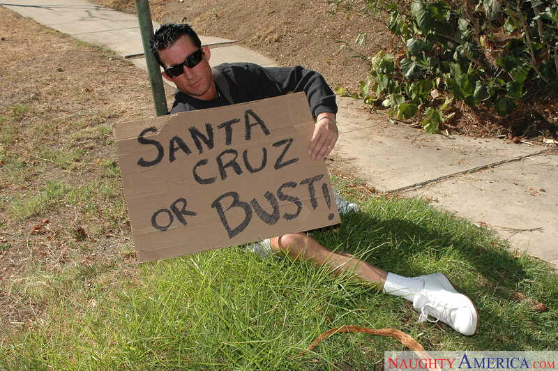 Naughty America Lexi Belle porn: Lexi Belle is holding a sign that says Santa Cruz or Bust!