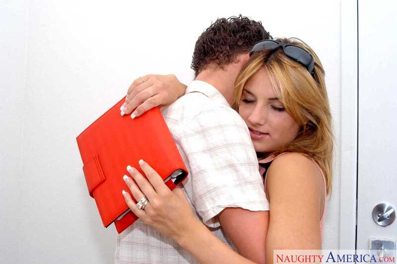 Naughty America Teagan Presley porn: Teagan Presley is hugging a man in a white shirt.