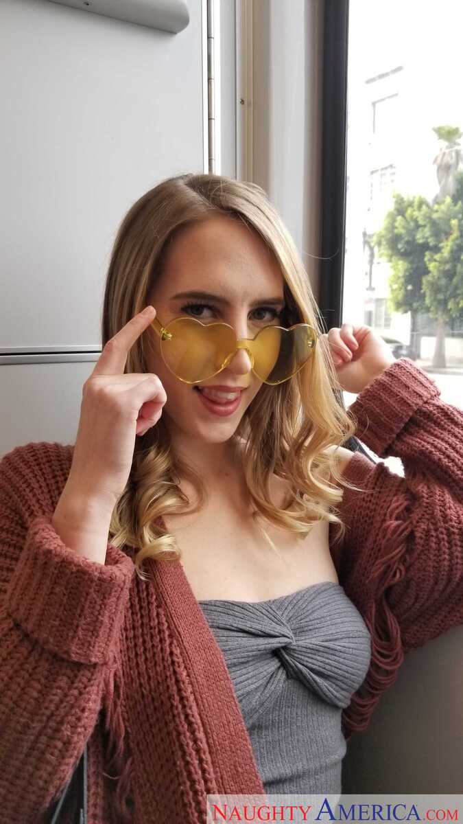 In the Cadence Lux Naughty America porn scene 'LA Slut Cadence Lux Helps Herself To Some Big  Stranger Cock' from LA Sluts, Cadence Lux is wearing a sweater and sunglasses.