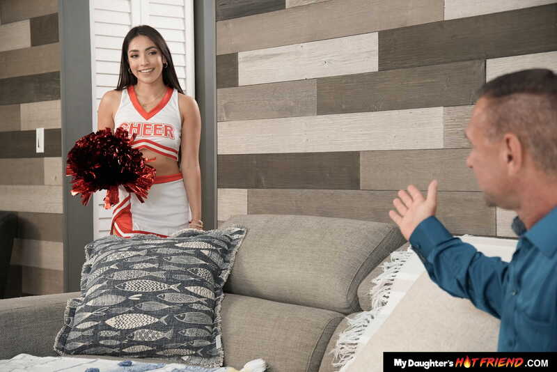 Scene from Naughty America Madison Wilde porn video 'College babe Madison Wilde is in the mood for a mature cock to fill her tight pussy!' where Madison Wilde is a cheerleader for the local high school.