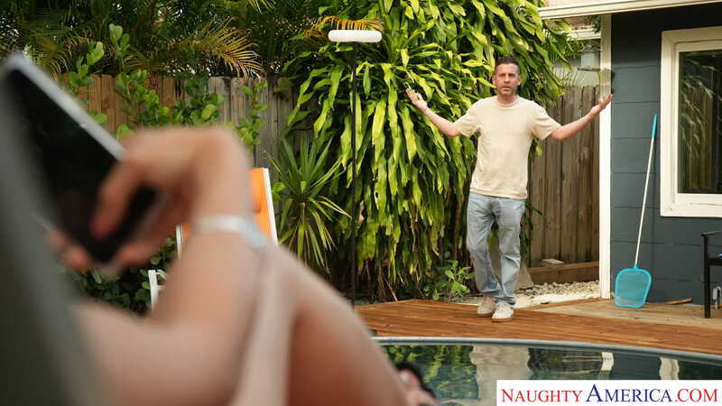 Naughty America Sasha Pearl porn: Sasha Pearl is taking a picture of a man in a backyard.