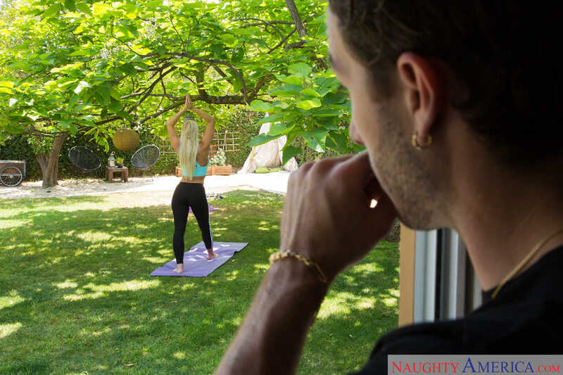 Scene from Naughty America London River porn video 'London River' where London River a is doing yoga in the yard while her husband watches.