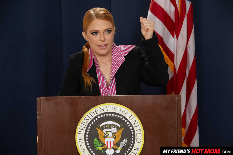 Naughty America Penny Pax porn: Penny Pax ton is speaking at a podium with the seal of the President of the United States on it.