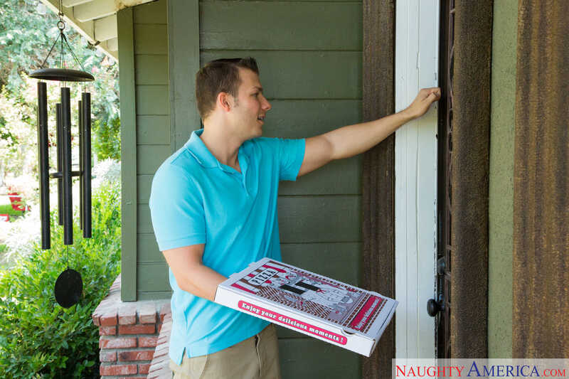 Scene from Naughty America Dolly Leigh porn video 'Pizza-Delivery Guy Strikes Again, This Time With Dolly Leigh' where Dolly Leigh is a character in the Naughty America.com series.