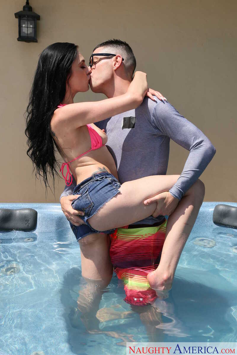 Naughty America Marley Brinx porn: Marley Brinx and her boyfriend are kissing in a hot tub.