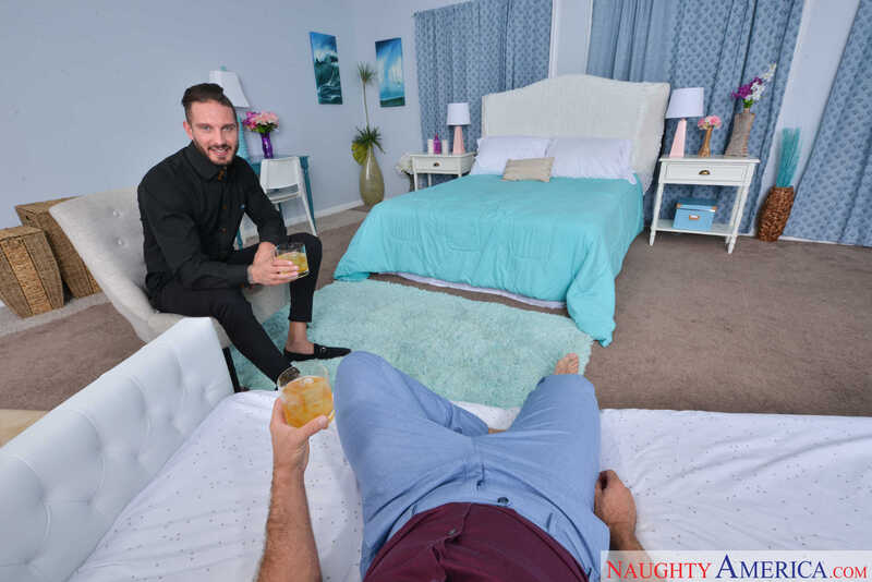 Scene from Naughty America Britney Light porn video 'A VR Porn threesome with Britney Light and your best pal' where Britney Light body is naked on a bed with a man.