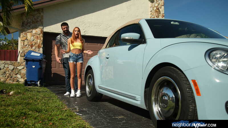 Naughty America Khloe Kapri porn: Khloe Kapri is standing next to a man in front of a blue car.