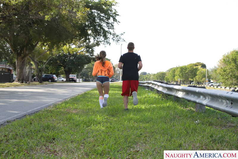 Naughty America Sofie Reyez porn: Sofie Reyez is running down the road with a man in red shorts.