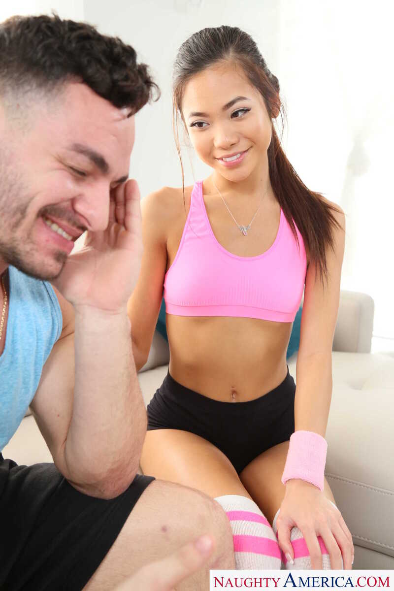 Naughty America Vina Sky porn scene 'Vina Sky Rides Her Stepbrother's HUGE Cock' - Vina Sky is a sexy Asian girl with a tight pink crop top and  shorts.