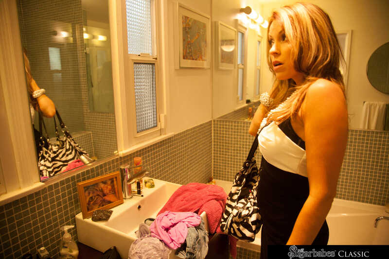 Milf Sugar Babes Courtney Cummz porn scene 'Courtney Cummz fucks dick good' - Courtney Cummz is looking at herself in the mirror.