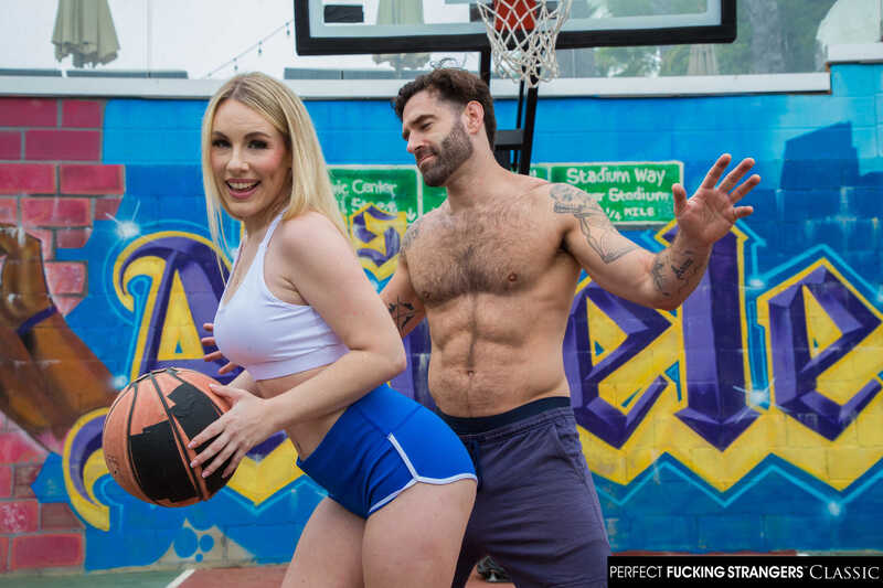 In the Bunny Madison Naughty America porn scene 'Sexy blonde Bunny Madison play's with the balls of a stranger' from Perfect Fucking Strangers, Bunny Madison and her perfect fucking strangers are playing basketball.