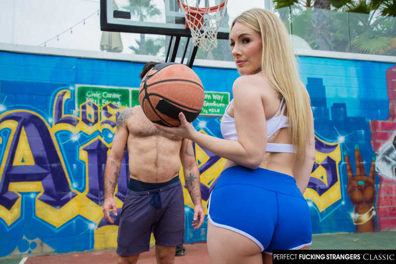 In the Bunny Madison Perfect Fucking Strangers porn scene 'Sexy blonde Bunny Madison play's with the balls of a stranger', Bunny Madison is holding a basketball in her hand.