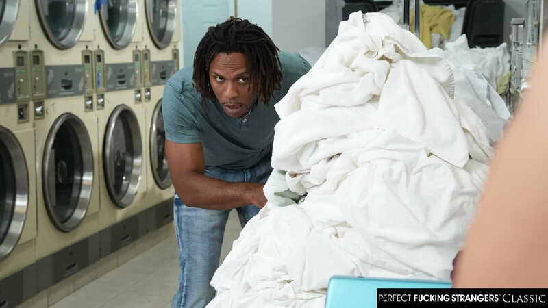 In the Callie  Naughty America porn scene 'Thick and sexy redhead Callie  gets hot and dirty cleaning her clothes' from Perfect Fucking Strangers, Callie  's character is in a laundromat, surrounded by washing machines and dryers.