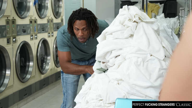 In the Callie  Naughty America porn scene 'Thick and sexy redhead Callie  gets hot and dirty cleaning her clothes' from Perfect Fucking Strangers, Callie  's character is in the laundry room, sorting through a pile of white clothes.