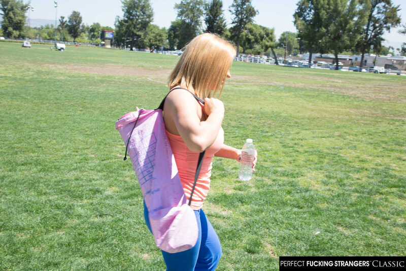 Naughty America Krissy Lynn porn: Krissy Lynn is holding a water bottle in her hand.