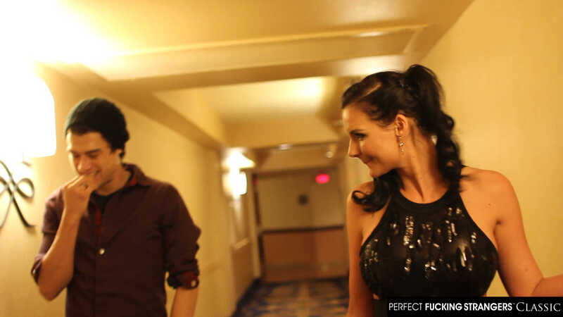 Naughty America Phoenix Marie porn: Phoenix Marie is in a hotel hallway with a man.