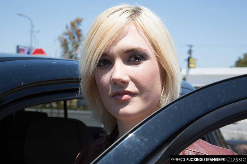 Perfect Fucking Strangers Siri Dahl porn scene 'Siri's big tits get wet with cum' - Siri Dahl is in a car with a red jacket on.