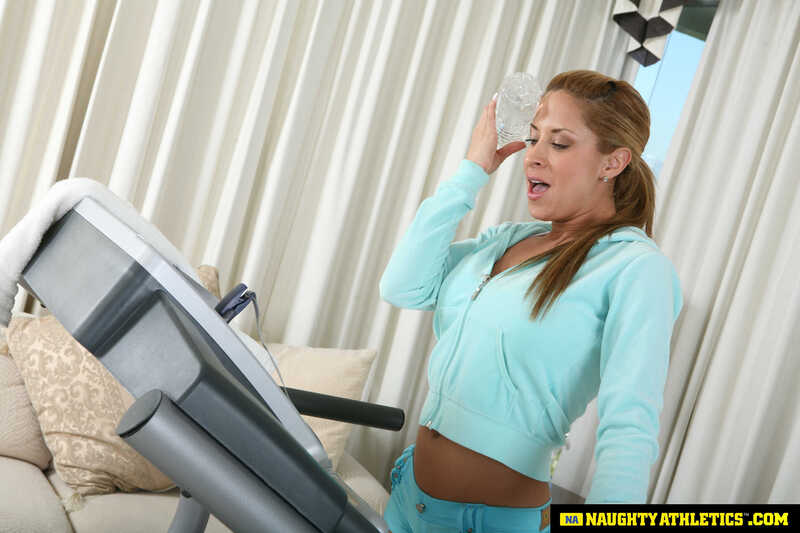 In the August Naughty America porn scene 'August fucking when working out' from Naughty Athletics, August 2015 Naughty Athletics.com workout video with a woman on a treadmill.