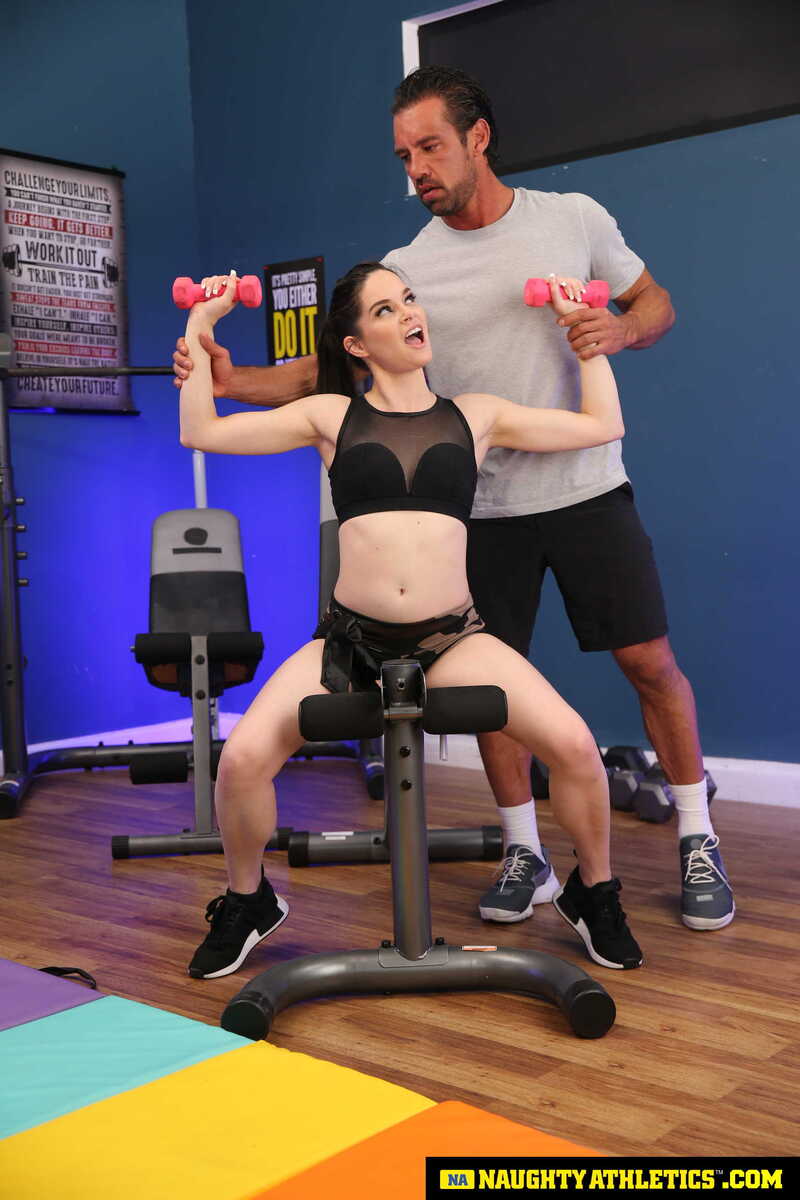 Scene from Naughty America Jenna J Ross porn video 'Jenna J Ross fucks her personal trainer' where Jenna J Ross is working out with a personal trainer.