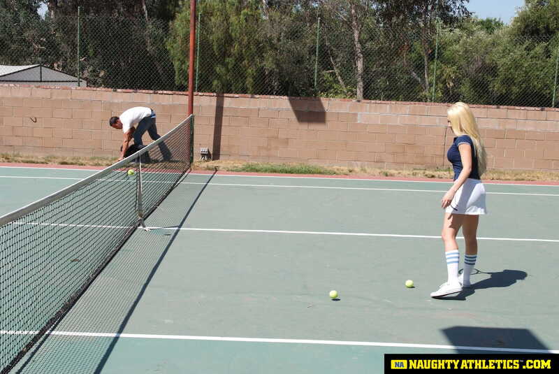 In the Kagney Linn Karter Naughty America porn scene 'Kagney Linn Karter serves up some outdoor fucking' from Naughty Athletics, Kagney Linn Karter is on the tennis court with balls.