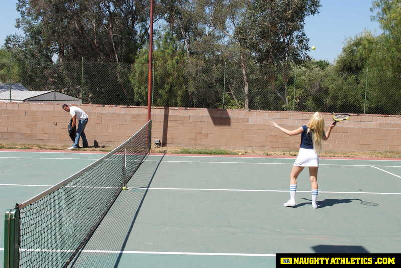 Naughty America Kagney Linn Karter porn: Kagney Linn Karter is playing tennis on a court.