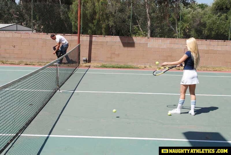 Naughty America Kagney Linn Karter porn: Kagney Linn Karter is practicing her tennis skills on the court.