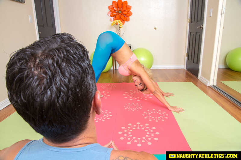 In the Luna Star Naughty America porn scene 'Latina babe Luna Star goes extra hard doing yoga with your cock in every way possible' from Naughty Athletics, Luna Star is doing a handstand on a pink mat.