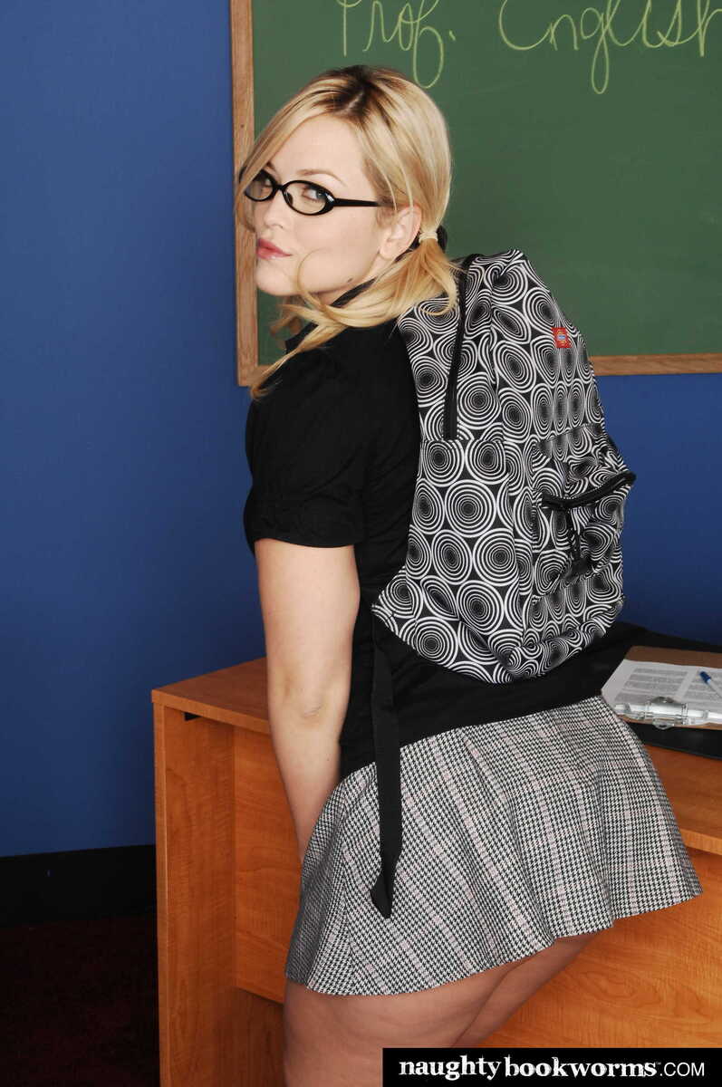 In the Alexis Texas Naughty America porn scene 'Alexis Texas fucks in classroom' from Naughty Bookworms, Alexis Texas is a teacher with a short skirt and a backpack.