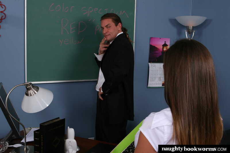 Naughty America Rachel Roxxx porn: Rachel Roxxx is standing in front of a chalkboard with the words "Color Spectrum" written on it.