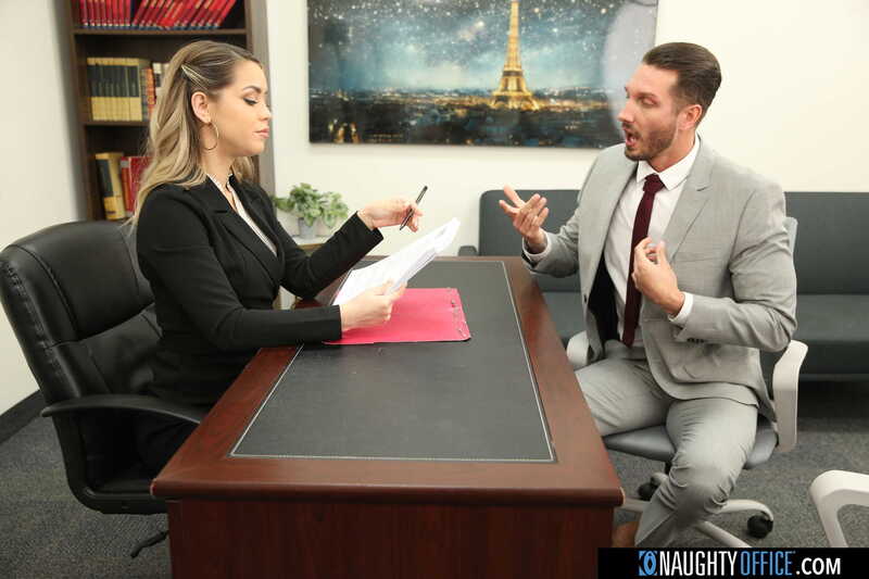 Naughty America Alina Lopez porn: Alina Lopez is interviewing a man in a grey suit.