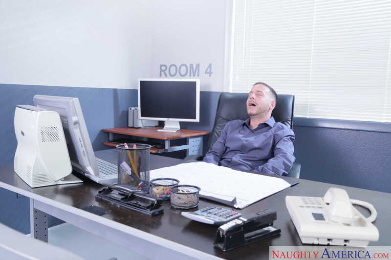 Scene from Naughty America Tucker Stevens porn video 'MILF Tucker Stevens fucking in the office with her blue eyes' where Tucker Stevens is a man who works in an office.