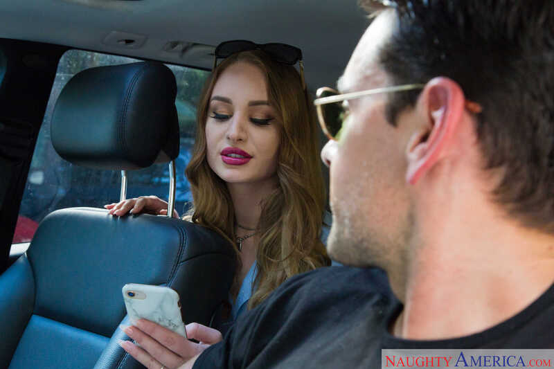 Naughty America Daisy Stone porn: Daisy Stone is in the backseat of a car with a man.